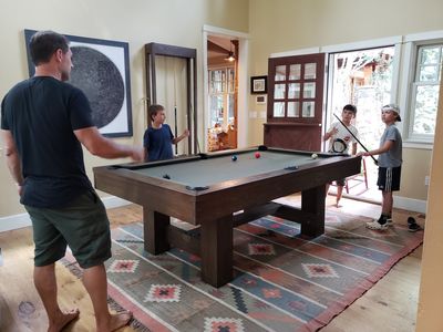Jeremy gave Zane, Zeke and Max some pointers on pool.