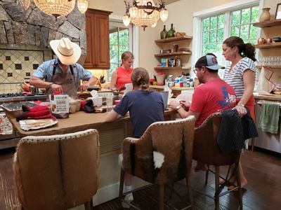 Back in the kitchen, mealtime preparations are heating up.
Seth, Angela, Madison, Josh and Jenny