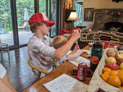 Meanwhile, Pierce was helping Reid with a coloring project.