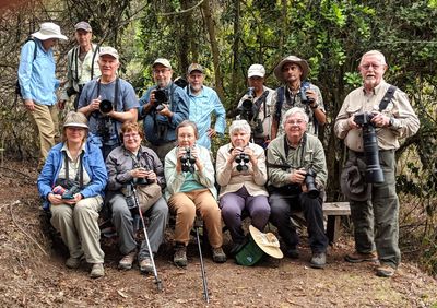 Enrique, one of our local guides, took this picture of our group (with Steve's phone) as we watched his feeders: Patti McLean, Mary, Carolyn, Ann, Jerry Davis, David Oakley (F); Patricia, Bruce, Steve, Michael Linz, Allan, Lelis, Kannan (B): Dec 16, 2018.