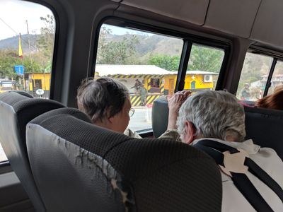 Carolyn and Ann, getting ready to get off the bus at the only military checkpoint along our route, December 16, 2018, southern Ecuador