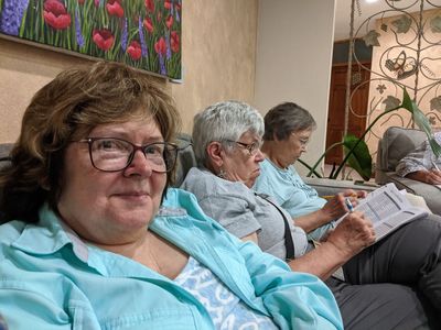 Reviewing our last day's checklist in the lobby of the hotel in San Jose: Mary, Ann and Carolyn. Feb 22, 2022.