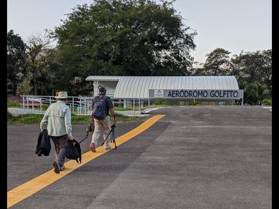 Carolyn and our guide, walking from the plane to the terminal at Golfito in southern Costa Rica. Feb 15, 2020.