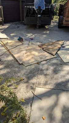 They used the old decking panels, filled with nails, as the templates for the new decking.