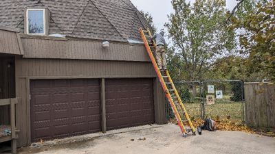 A single fellow came over and did some clean-up work, but I still had concerns about the foam on the shingles over the garage.
