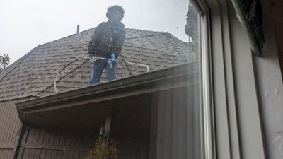 Later that day, the foam crew returned to put the sealer coat over the foam that will protect from the sun. I shot this photo from a window on the S side of the sunroom.