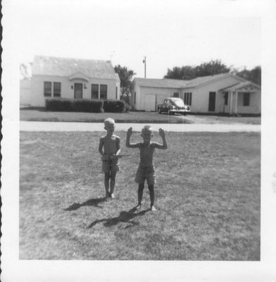 Steve and brother Gerald 'playing guns' in the front yard on SW 31st