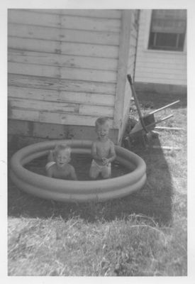 Steve and Gerald, in an inflatable pool in the back yard at SW 31st St