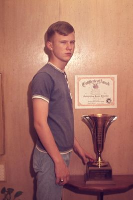 Steve, with his Oklahoma Science Fair award, in 10th grade, which allowed me to go to the national science fair with Sam Houston III; my project involved torturing harvester ants, his used cockroaches. I got to keep the certificate, but not the trophy. Years later, I learned Sam had become a well-respected and much-loved science teacher in the OKC schools.