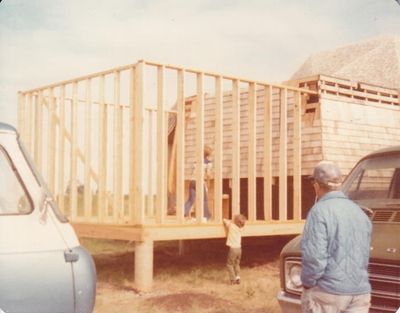 Seth and Jeremy playing on the framing of the kitchen we added to the shell of the first dome, with their grandad looking on. I think Mary and I stood up those walls by ourselves.