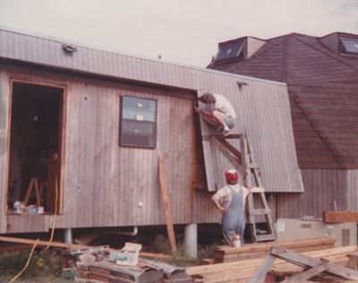 Grandad Joe made what he called 'jacks' that allowed working at higher levels without moving a ladder around. Usually 2 were used, with a plank between them, to walk on, but sometimes one was used as a makeshift ladder.