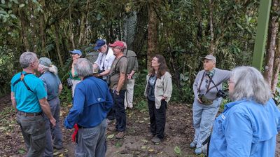 The Paz family has built a pavilion with feeders around it where we waited while they tried to locate another antpitta.
Ross, Dawn, Nadine, Jerry, Jimmy, Andres, Garry, Vickie, Tice, Mary