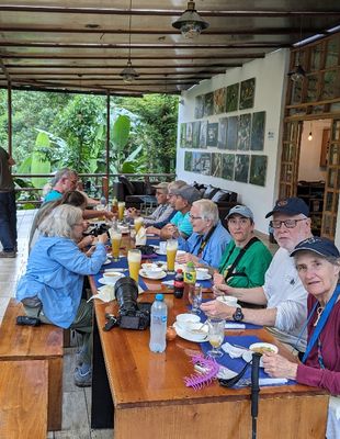 We stopped at Mirador Guaycapi restaurant for lunch, ate on the patio, and watched birds at the feeders.
Andres, at the rail, Mary, Vickie, Ross, Dawn, Tice, Jerry, Carlos, Becky, Nadine, Jimmy, Rebecca
