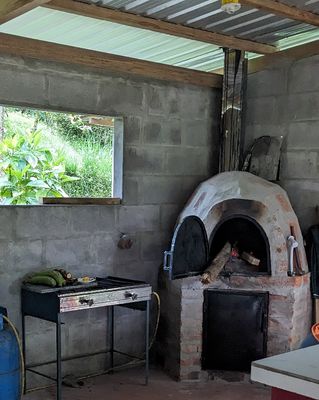 They had a building at the back of their view deck with a propane stove and a brick oven.

Last of Day 7: Sat, Mar 10, 2024--at San Isidro Lodge, then to La Brisa hummingbird feeders