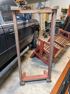 Base and legs, with seat in background