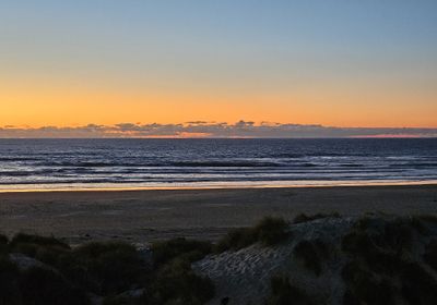 When we got back to our room, this was our view out the window: sunset over the Pacific Ocean.