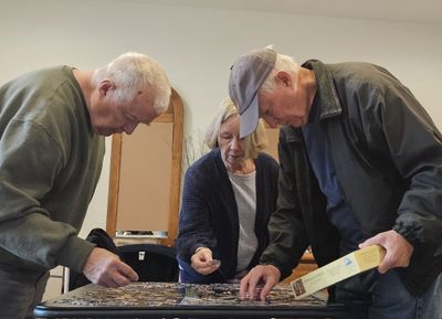 Ron left and Kathy took his spot. We were getting ready to go to supper, but the puzzle called.