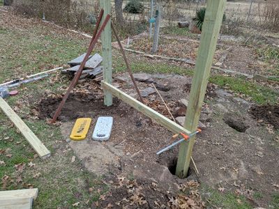 I put one screw in the horizontal piece to attach it to the left post at the height I want the bench, minus the thickness of the bench seat, then leveled the horizontal piece and clamped it to the right post to screw into place using 2.5 deck screws.