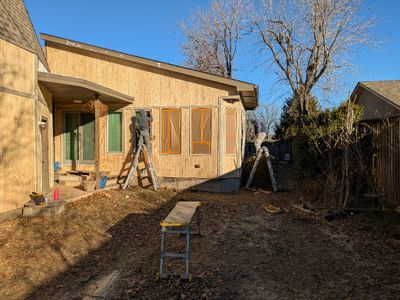 They did an excellent job of masking windows, shingles, foundation and fixtures before starting to paint.