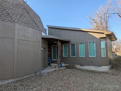 E wall of big dome, back porch and S wall of sunroom