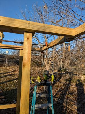 Another nice day (actually unseasonably hot) allowed me get some more work done. I wanted to double all the outer supports for the roof rafters and got that done today.