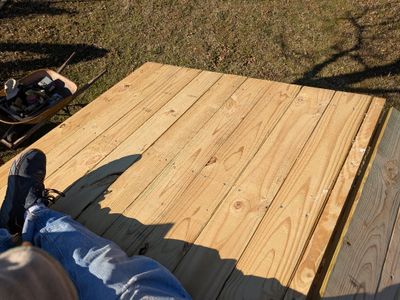 I had climb onto the roof to put the last couple of rows of decking in place.