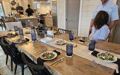Jenny and Josh were the first to settle in for dinner as the chefs worked in the kitchen.