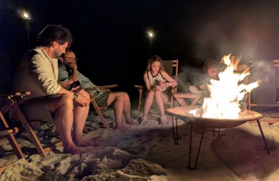 After dinner, the company also arranged chairs and a fire for us on the beach.