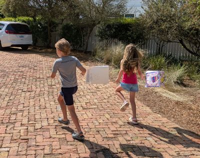 Carson and Alexa tear into the yard.