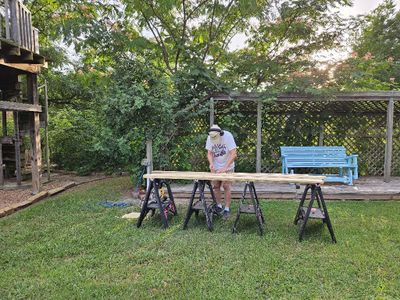 I took 3-4 measurements for each slat to get the width and angles where the ends met the rock border on each side. Sometimes I could remember all the measurements till I got them marked on the board.
