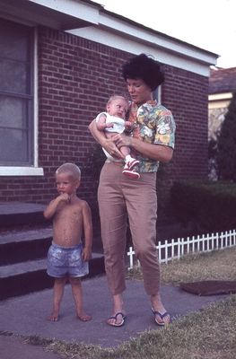 Chris Cordell, Patty Sue Harris Cordell Herndon, with Mark Herndon?
196407  Chris, Mark? and Pat in front of unIDd house