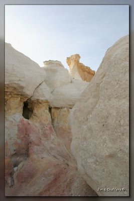 Selenite (gypsum) contributes to the color, and white quartzitic crystals dazzle the eye