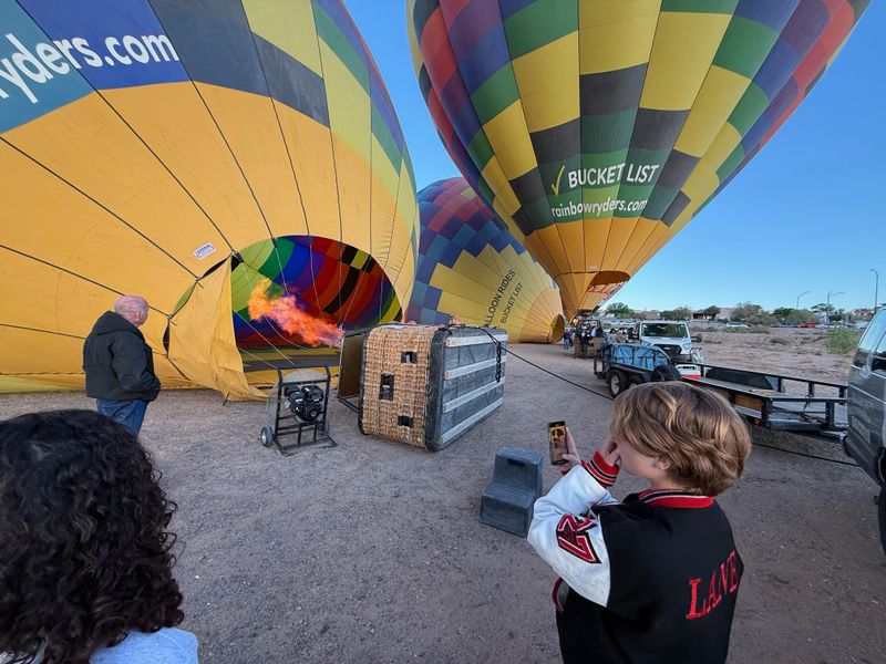 KJ watches as the balloon is almost ready for action.