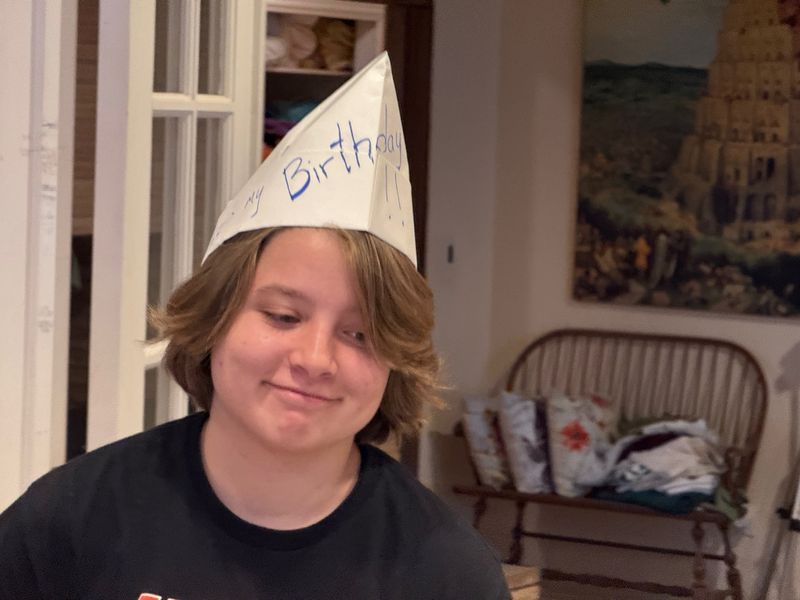 I made Annie a birthday hat.  And to my surprise she was willing to wear it!!  Win!