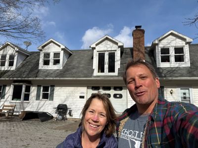 Siblings posing in front of the homestead at Lane Mountain.