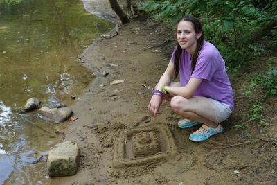 Helen Drawing In the Sand