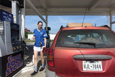 Helen Getting Gas for Mommy's Car in Conway