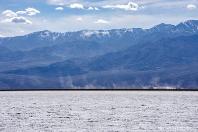 Salt plain and mirage at the foothill 