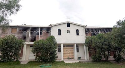 New building for residents, with chapel and training rooms.