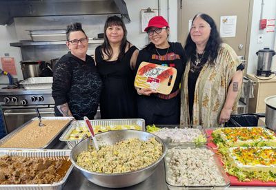 Marnie, Carmen, Carla and Brandy showcasing the food.