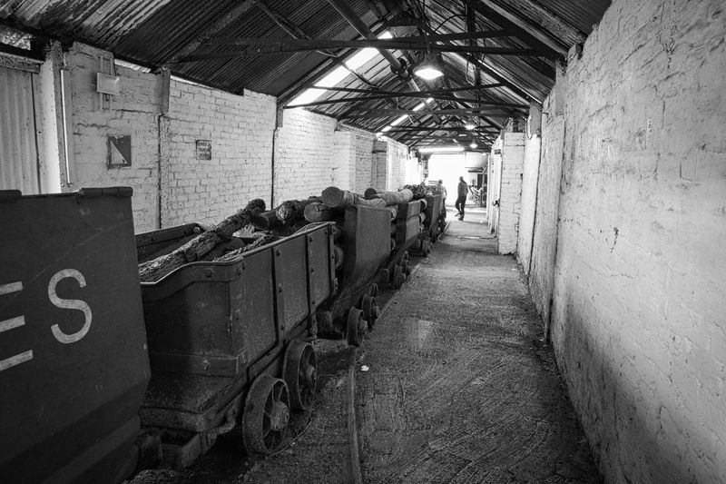 Drams full of pit props at the pit head.