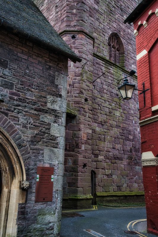 Narrow lane around St Marys Church Tower, Brecon.
