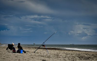 Fishing at Llantwit Major beach.