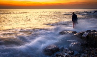 Rest Bay sunset and high tide.