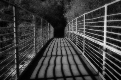 Shadows on a footbridge.