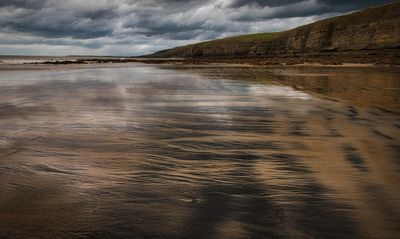 Sand and coal.