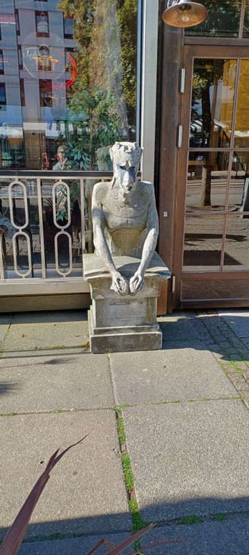 Couple of cool Gargoyles or rather Grotesques decorating the front of Bistro Français