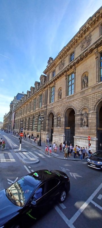 The Louvre Palace wall at the Place du Carrousel entrance