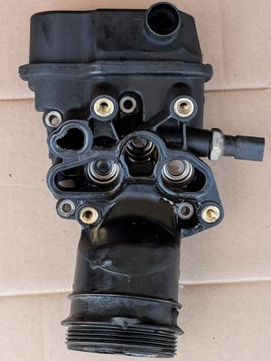 Old Oil Filter Bracket 06F 115 397 H front