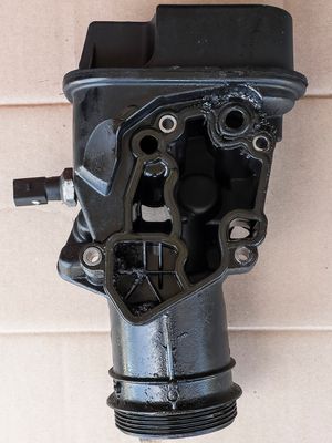 Old Oil Filter Bracket 06F 115 397 H  back